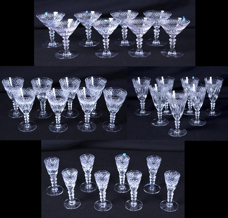 Hawkes Crystal Glasses (thirty-one): Champagne (8), Wine (8), Water (7) and Cordial (8) glasses, each hallmarked, sizes from 6 ½” to 4” tall. (31)