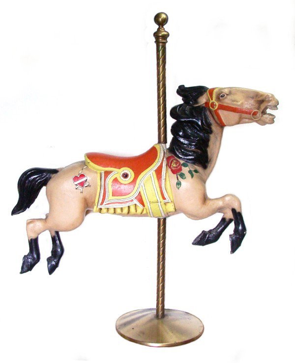 Decorative Arts: Stillman Carousel Horse: Stillman carousel horse of carved and painted wood, horse 37" tall, 62" wide, with brass center pole 72" tall. Assembled horse height 58". Acquired from the Hansen Dam Merry Go Round circa 1970's, los