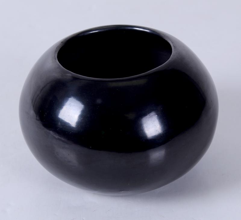 Maria Poveka Montoya aka Maria Martinez (b. circa 1887-1980) San Ildefonso Pueblo: Glazed Blackware bowl, signed underneath, 2 ¾” tall, 4 ½” diameter.