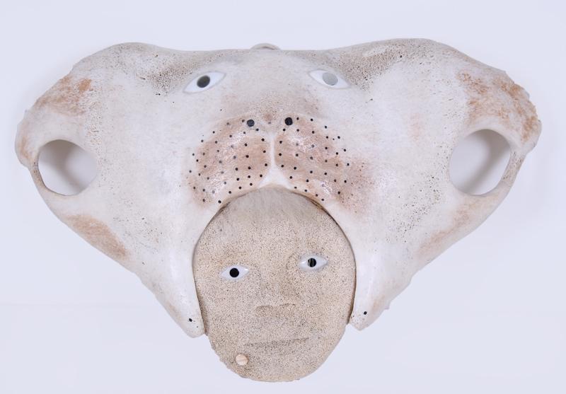 Charlie Olanna (20 th Century) Alaskan Inuit: MYSTIC FIGURE, mixed media sculpture, signed on verso, overall 10 ¾ x 16 ¼ x 4 ¼”.