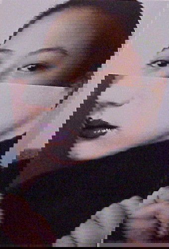 Emily Cheng (b. 1953) American: TARA WITH HANDS, 1999, color Iris print, signed and dated on verso, from the numbered edition 8, sheet 30 x 20".