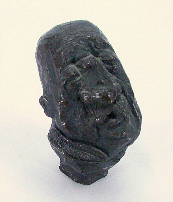 Charles Bragg (b. 1931) Californian: HEAD WITH COLLAR, cast bronze sculpture, 3 ½" tall.