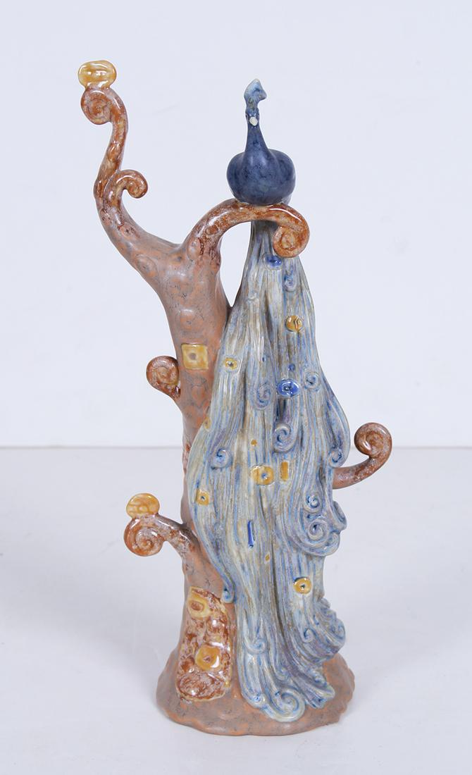 Lladro porcelain: BIRD OF PARADISE, 2005, retired 2009, painted and glazed porcelain statue, sculptor Antonio Ramos, hallmarked underneath, 12 ½” tall.