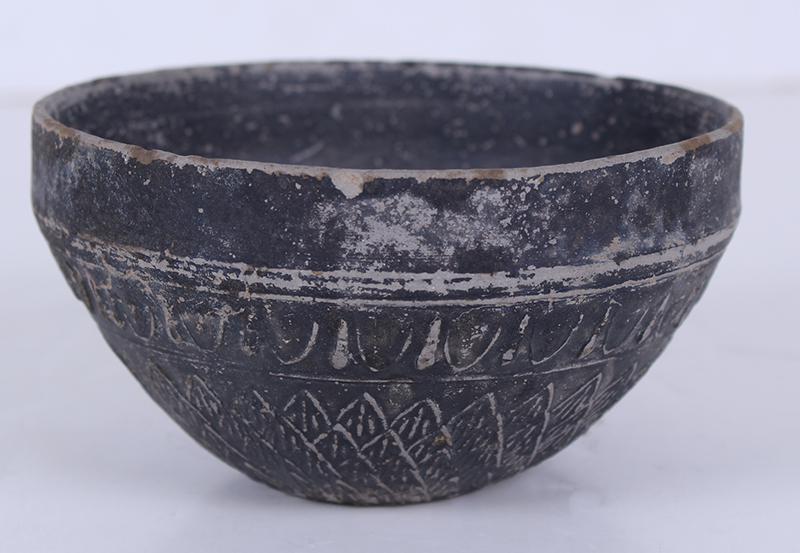 Greek Antiquity 2 nd â€“ 1 st Century BC: Hellenistic ceramic bowl with design in relief, 2 ¾” tall, 4 ¾” diameter. Provenance: Charles Ede Ltd. London, with certificate and receipt.
