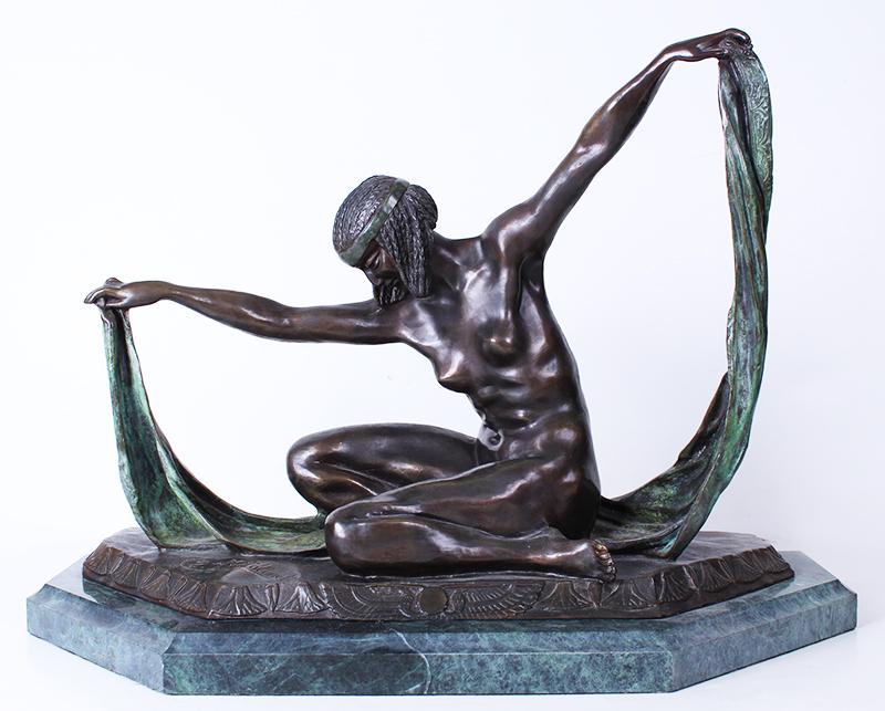 after Claire-Jeanne-Roberte Colinet (1880-1950) French: ISIS, cast bronze with dark brown and green patina, signed, with green marble base 15 ½ x 22 x 9 ½”, weight 50 lbs.