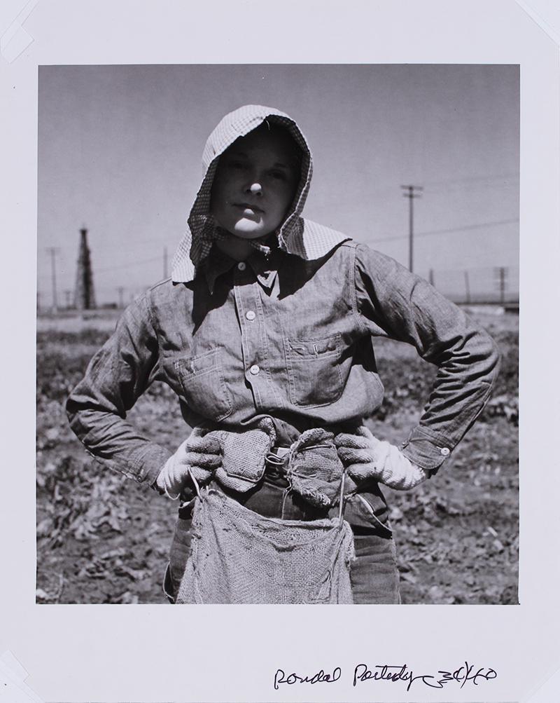 Rondal Partridge (1917-2015) California: POTATO FIELD MADONNA, KERN COUNTY 1940, gelatin silver print, signed in ink lower right, 10 x 8”, matted.
