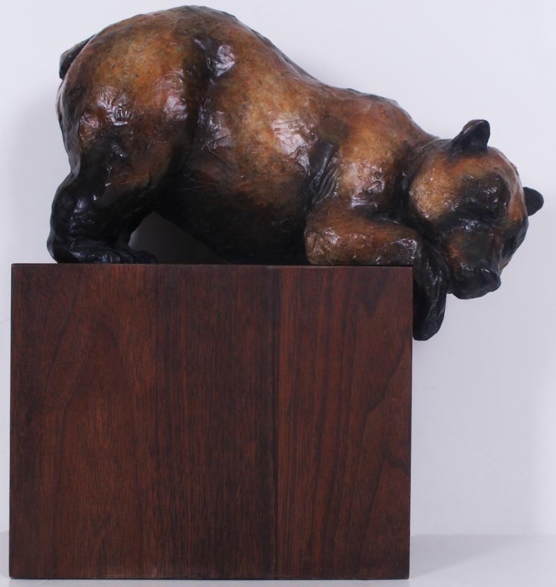 Shirley Thomson-Smith (b. 1929) Colorado: HANG OVER BEAR, cast bronze sculpture with patina, signed and numbered 4/30, overall 13 ½ x 12 ½ x 6 ¼” including wood base, weight 15 lbs.
