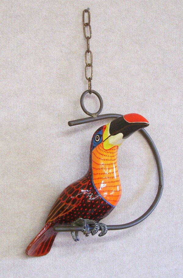 Sergio Bustamante (b. 1942) Mexican: TOUCAN, hand-painted papier mache multiple, signed and inscribed artist's proof, with metal suspension bar, height from feet to chain 22", width overall 16", 18" deep.