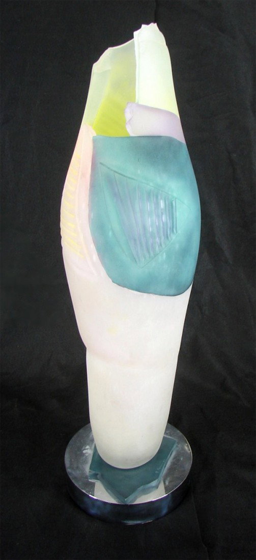 Danny Perkins (20th Century) American: UNTITLED, 1983, blown colored glass sculpture, signed and dated, 29" tall, on metal base, minor surface soiling, otherwise in good condition.