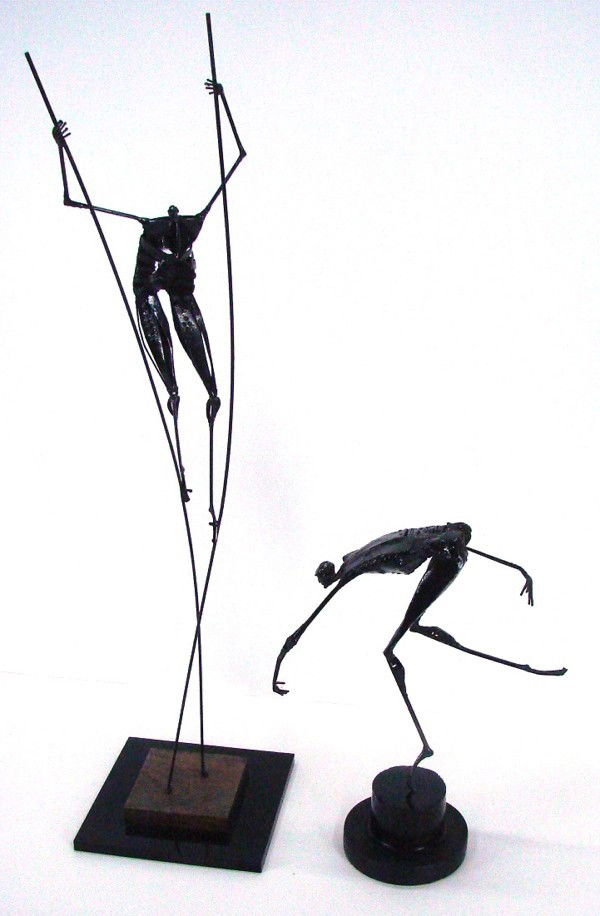 Robert Stoller (mid-20th Century) American (two): RUNNING MAN; MAN ON STILTS, two welded and painted metal sculptures, 14 ½" & 32 ¼" including stands. (2)