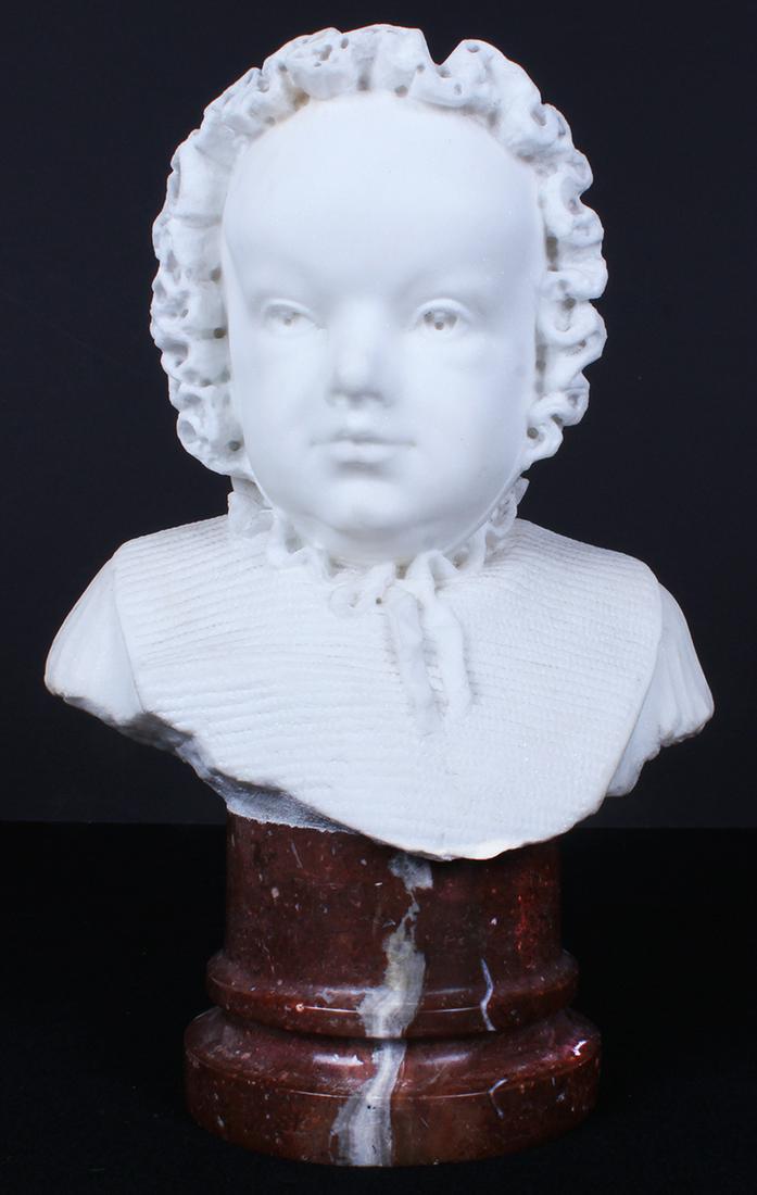 American School (19 th / 20 th Century): BUST OF A CHILD WEARING BONNET, white marble sculpture mounted on brown marble plinth, monogram â€œW” on backside, overall 14 x 9 x 5 ½”, weight 25 lbs.