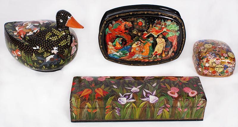 Decorative Boxes (four): Four intricately painted and lacquered lidded wood boxes, three from Kashmir and one from Russia, three marked underneath, largest 4 ½ x 4 x 6 ¾”. (4)
