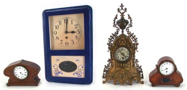 Continental Wall & Mantel Clocks (four) & another: Country Regulator blue and white wall clock with pendulum, with key, 18 ¼” x 12” x 5”; An ornate continental mantle clock with brass, 20” x 11” x 4 ½”; A Continental wood mantel clock wi