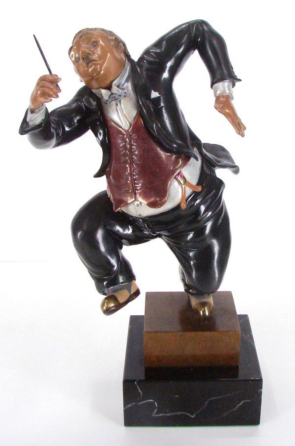 Hiro Yamagata (b. 1948) Japanese: THE CONDUCTOR, 1988, polychrome bronze sculpture, signed and dated, from the Roman numeral edition of 4 aside from the regular numbered edition, Martin Lawrence Editions, 19” tall including marble b