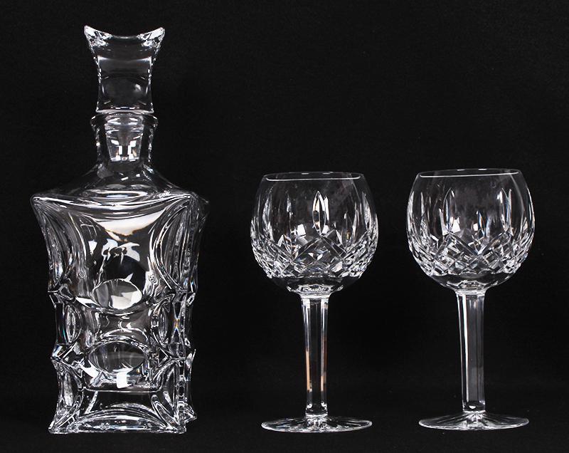 Art Glass: Bohemian Decanter & Waterford glasses (three): Bohemian Czech Republic leaded glass decanter, 11 ½” tall; Together with two Waterford cut-crystal wine goblets, each 7 ¼” tall. (3)