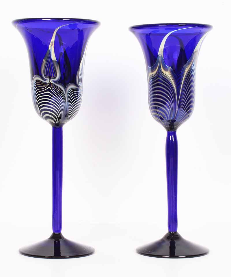 Art Glass: Correia (two): Cobalt Heart & Cobalt Feather, two color-glass wine goblets, each signed, both with studio paperwork, 10 ¼” tall each. (2)