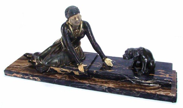 Arman Godard (19th/ 20th Century) European: WOMAN WITH DOG, cast bronze and ivory sculpture, signature in marble base, 11” tall, 7” deep, 29” wide including stylized 1 ½” tall base, ivory darkened, bronze with some loss of patina, wear