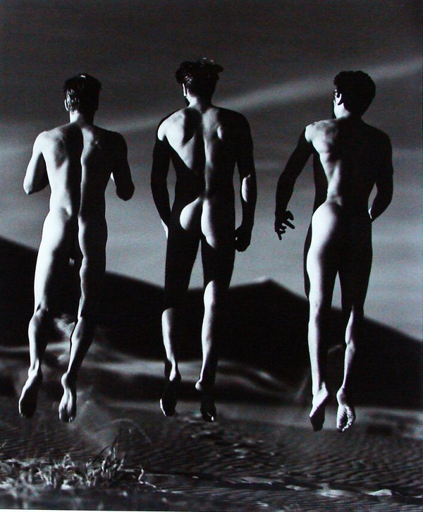 Photography: Greg Gorman (b. 1949) American: JUMPING BOYS, 1991, silver gelatin print on card, signed and dated and with the artist’s stamp on the verso, 23 ¾ x 19 7/8”, the numbered edition 15.