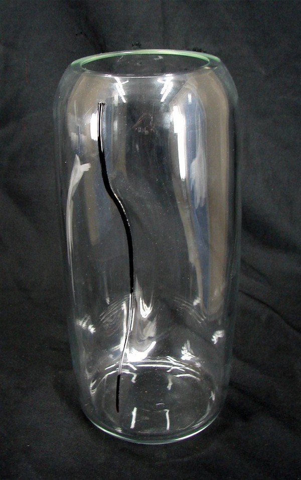 Decorative Arts: Alfredo Barbini glass: Hand-blown glass vase, signed and inscribed Murano underneath, 12” tall, 5 ½” diameter, small normal scratches underneath associated with use, otherwise in good condition.