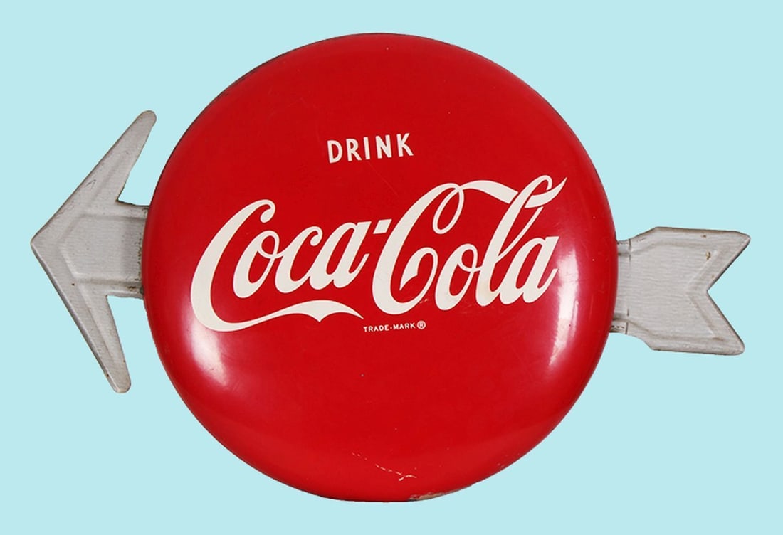Vintage ‘Drink Coca-Cola’ advertising sign: Metal sign with directional moveable arrow, diameter of coke 16”, diameter with arrow 24 ½”.