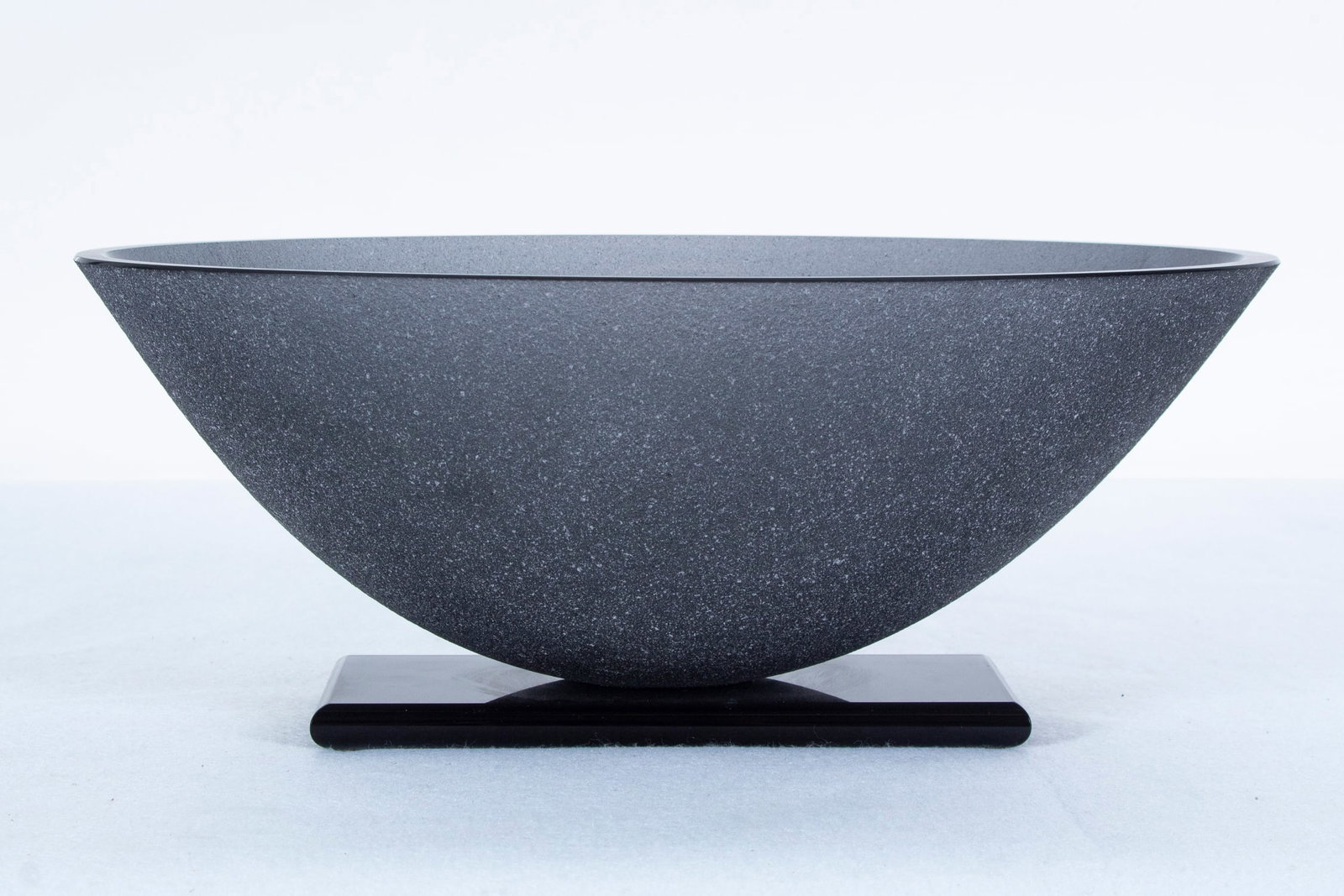 Stephen Schlanser art glass (b. 1949) American: Smoky colored crystal oval bowl with textured finish, signed and dated 1992 underneath, 5 ¼ x 13 ½ x 8”.