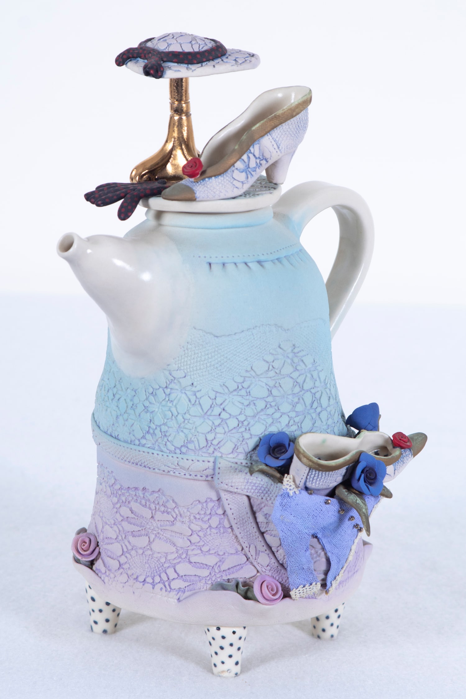 Laura Peery (b. 1952) North Carolina: Dress up with hat and shoes, painted and partially glazed ceramic teapot, a signature not found, 10 ¼” tall, 6 ½” wide. Acquired from/ Provenance: Del Mano Gallery, June 1993