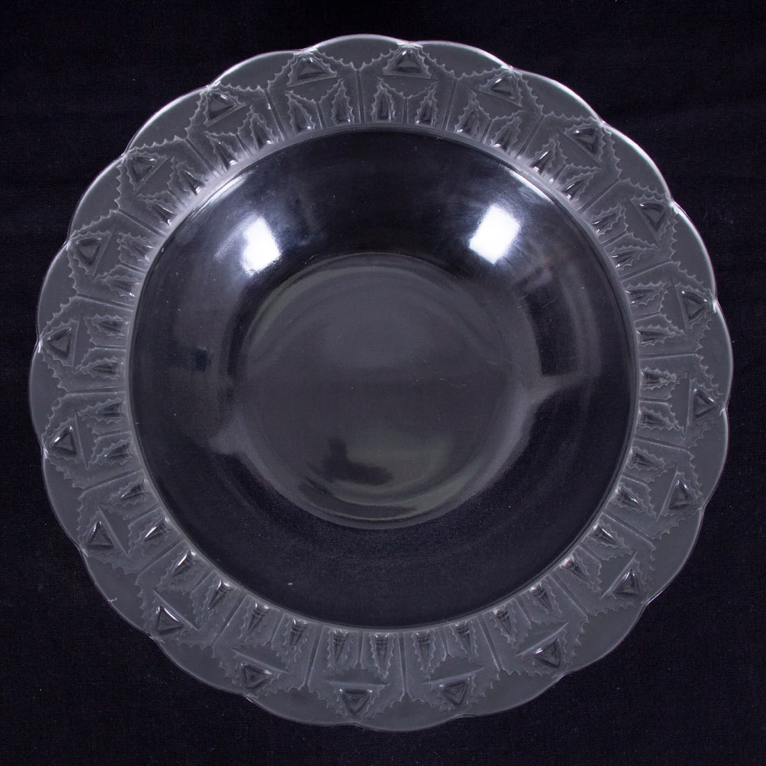 Lalique Crystal Bowl: Glass bowl with patterned on wide rim, signed underneath, 2” tall, 10 ½” diameter.