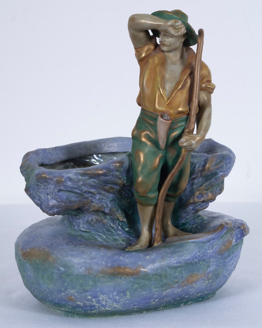 Imperial Amphora (1892-1945) Austrian: Art Nouveau Figural Vase (Man with Sickle), painted and glazed vase with mottled iridescent body, hallmarked underneath, 13 ¼ x 10 ½ x 7 ½”, may have some natural glazing an