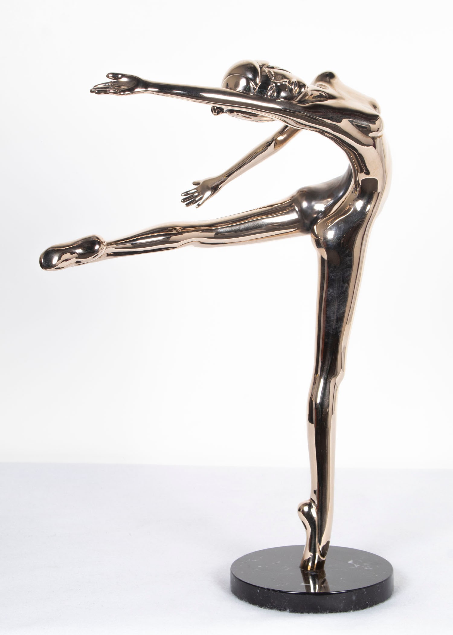 Tom Bennett (1928-) California: CARRIE, 1983, cast bronze sculpture with high polish, signed and dated and numbered 62/150, overall 19 ¼ x 14 x 7 ¾” including marble base. Provenance: Artist’s signed certificat