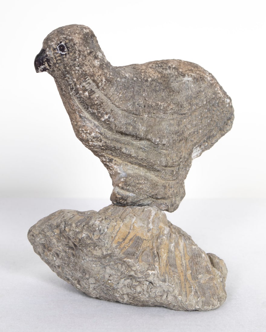 Inuit Art: Tagonaguk, Frobisher Bay, Canada: BIRD ON A PEDESTAL, carved steatite statue in two pieces, a signature not found, overall 9 x 6 x 7 ½”. Provenance: From the collection of Museum of Riverside, California.