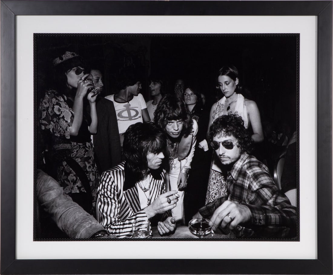 Ken Regan (1940-2012) American: Bob Dylan attending Mick Jaggers 29th birthday party in New York City, 1972, with Keith Richards, gelatin silver print, sight 15 ¼ x 20”, frame 21 x 25 ½” with glass.