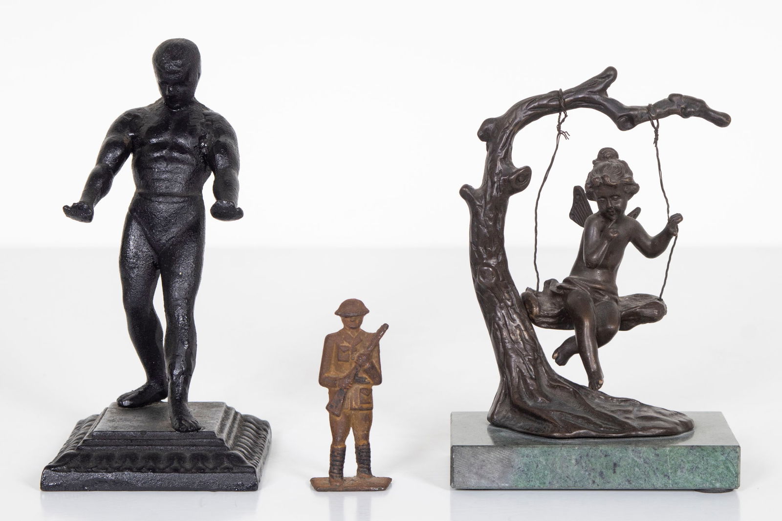 Cast Iron figures & a bronze  (three) (1 of 3)