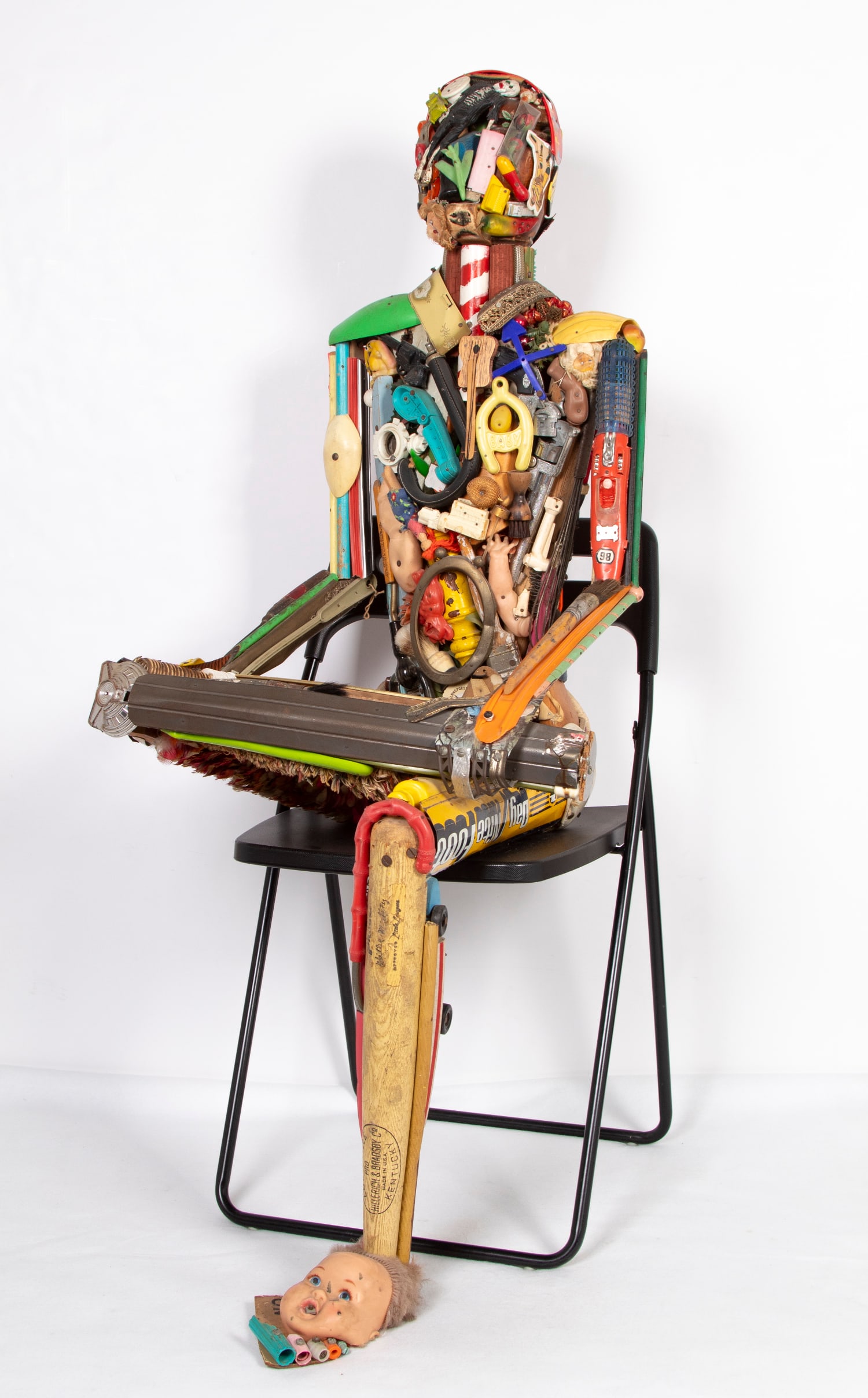 Leo Sewell (b. 1945) Maryland Philadelphia: SEATED FIGURE, found object mixed media sculpture, signed lower center, 50 ½ x 21 x 21”, weight 30 pounds. Chair not included.