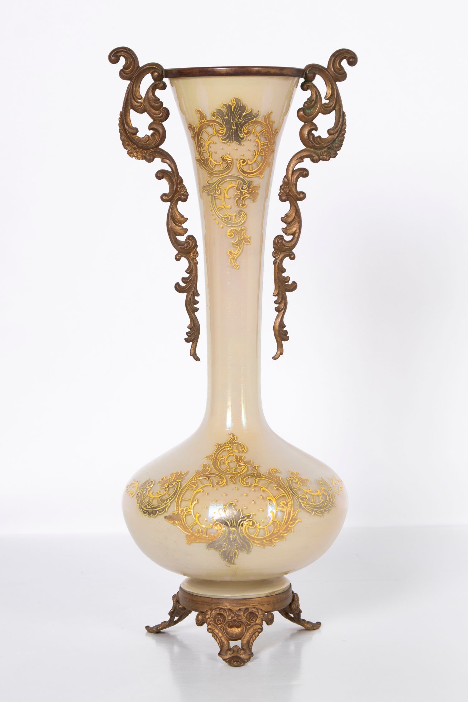 Victorian Vase: Iridescent glass vase with gold overlay flanked with metal handles, rim and footed base, unmarked, 14” tall including handles.