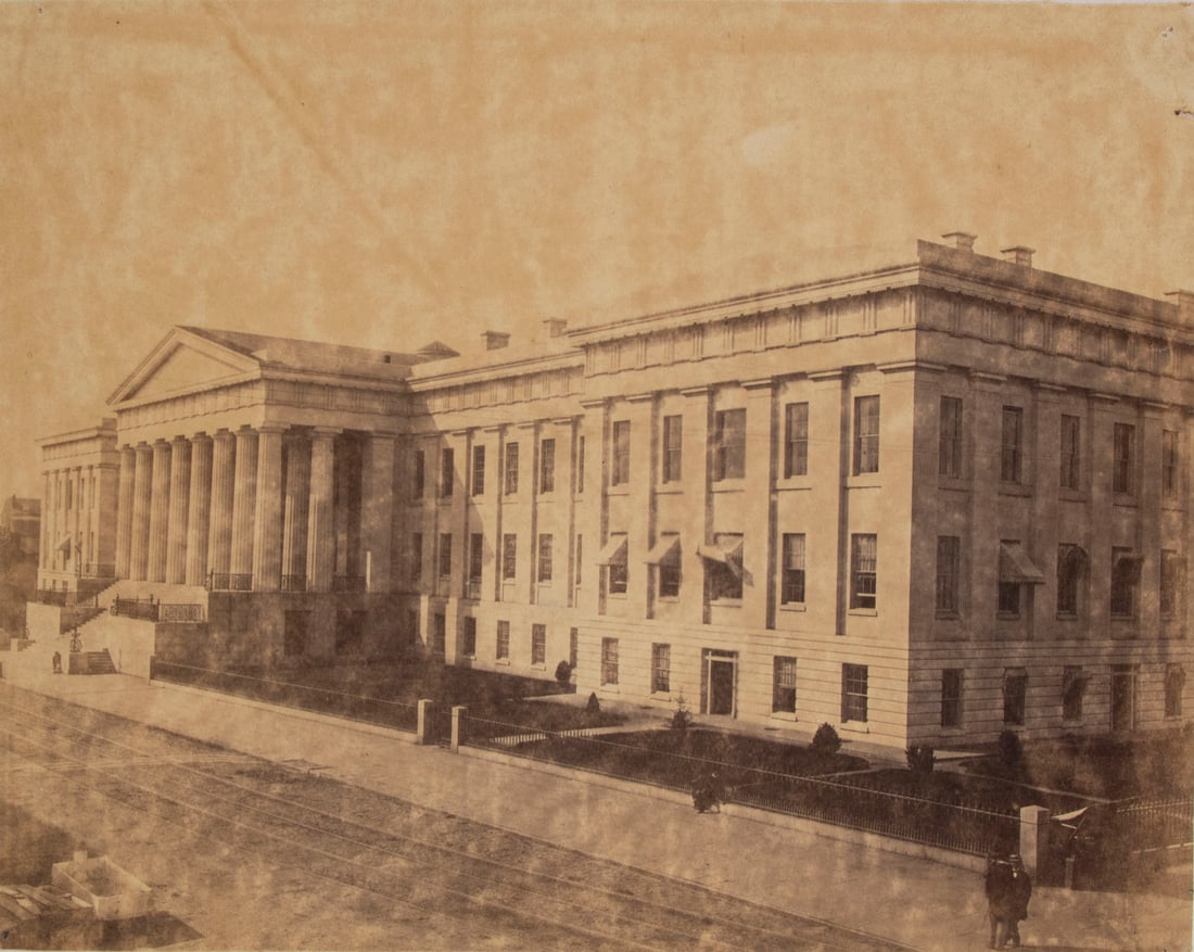Alexander Gardner (1821-1882) Scottish (two): THE UNITED STATES TREASURY BUILDING, WASHINGTON, D.C., two views circa 1874, two albumen prints, printed photographer's credit, images 6 7/8 x 9”, both on original sheets 12 x 17 ¾”