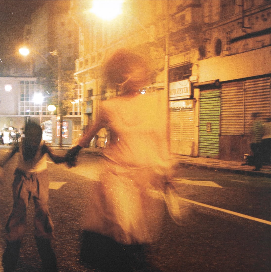 Brazilian photographer unidentified: TEMOS QUE IR!, 2006, digital print on aluminum photo board, signed and numbered 1/12 and dated in marker on verso, 17 ¾ x 17 ¾”. From the Larry Grossman Collection, Hollywood write