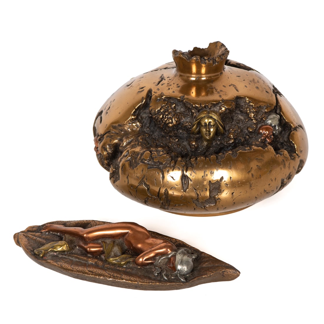 Giovanni Schoeman (1940-1980) South African (two): NYMPHS AND CUPIDS IN THE WOODS, 1979, mixed metal bronze sculpture, signed and dated and numbered 313/1000 underneath, 4 ¼” tall, 6” diameter; NYMPH SLEEPING ON A LEAF, 1978, mixed