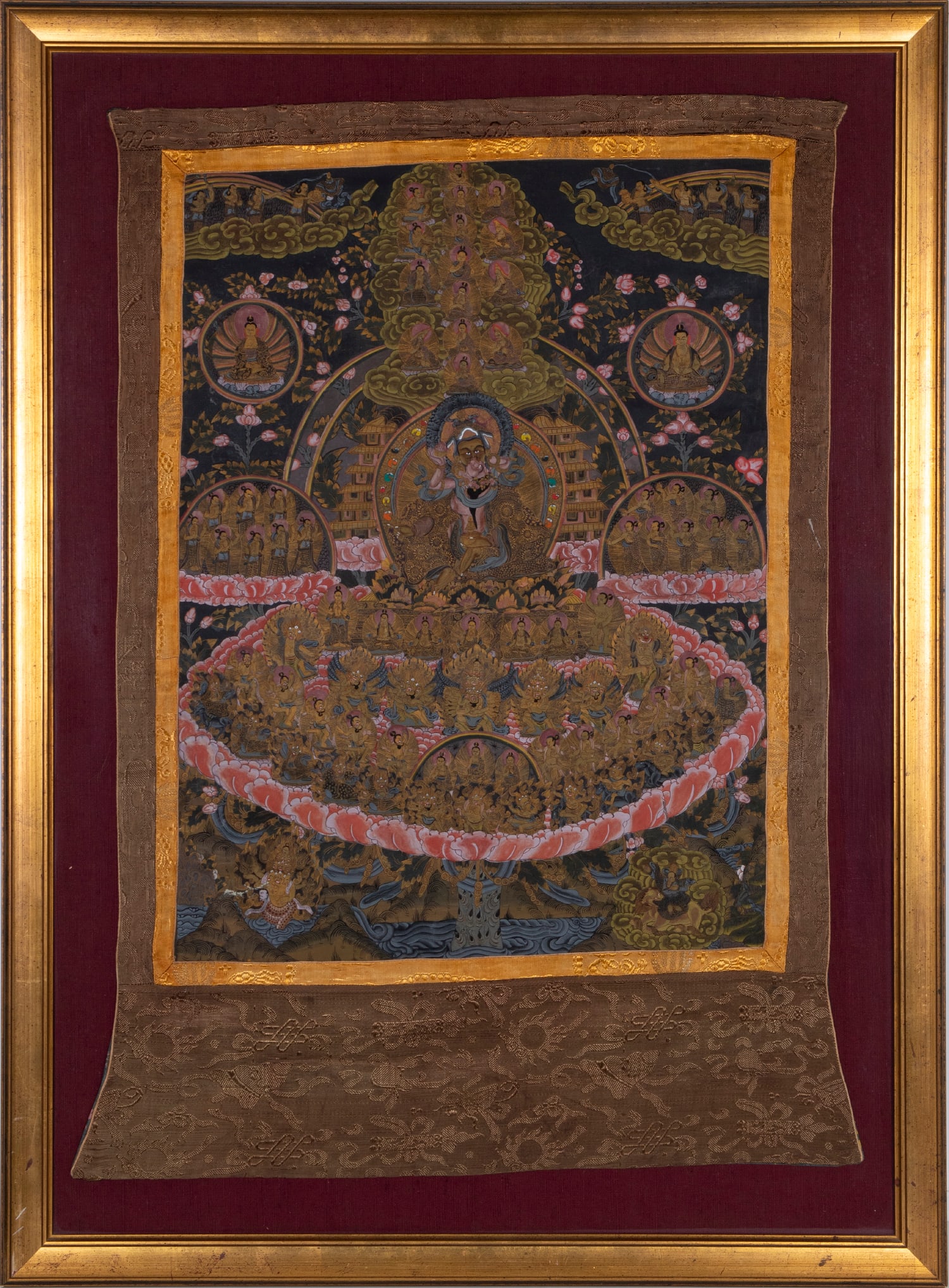 Tibetan Thangka (Thanka): Hand painted and embroidered silk, 38 x 28”, frame 45 ½ x 33 ½” with glass.