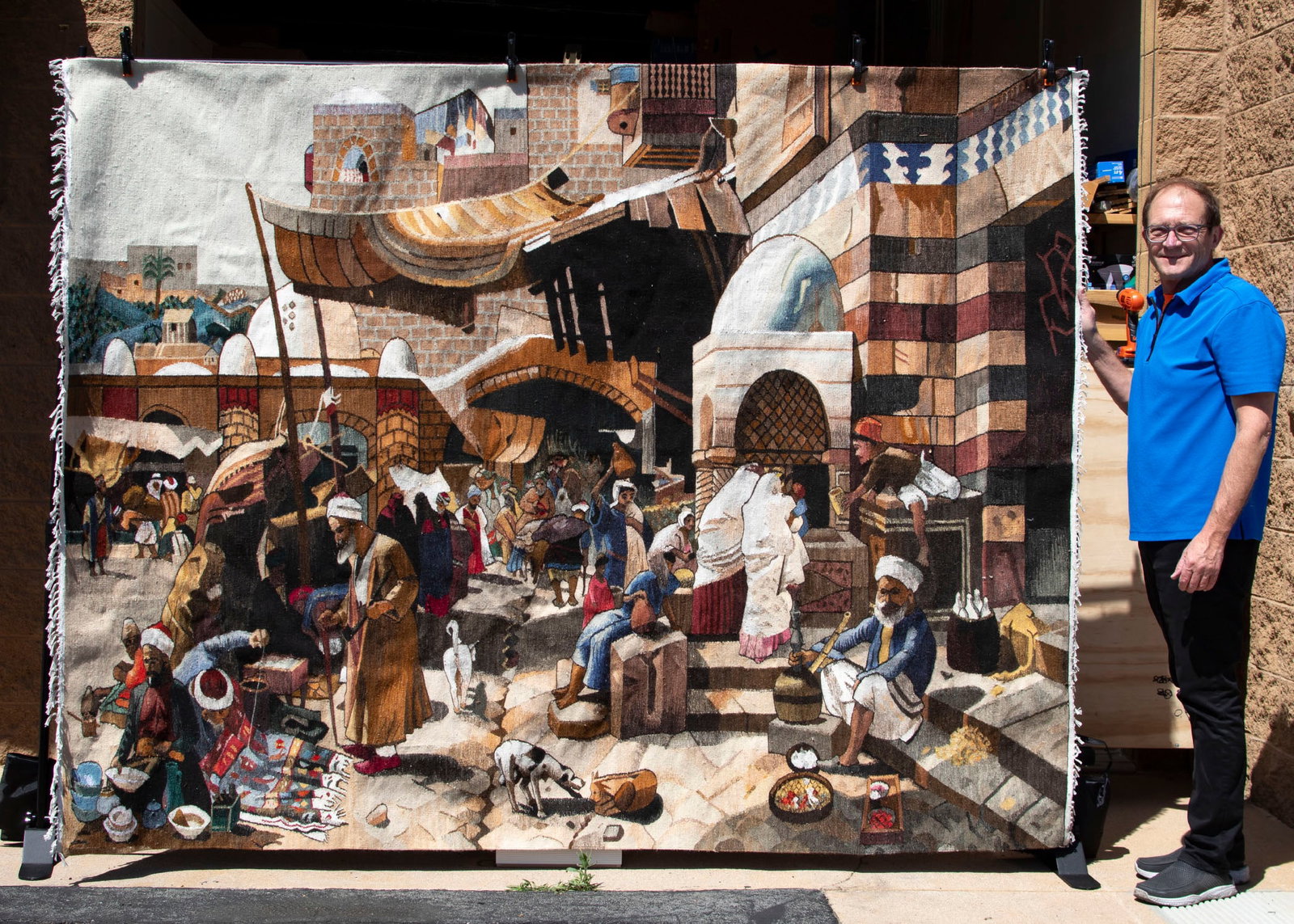 Egyptian Tapestry/rug: MARKETPLACE, woven tapestry with traditional motif, a signature or hallmark not found, 75 x 99”, 101” with fringe.