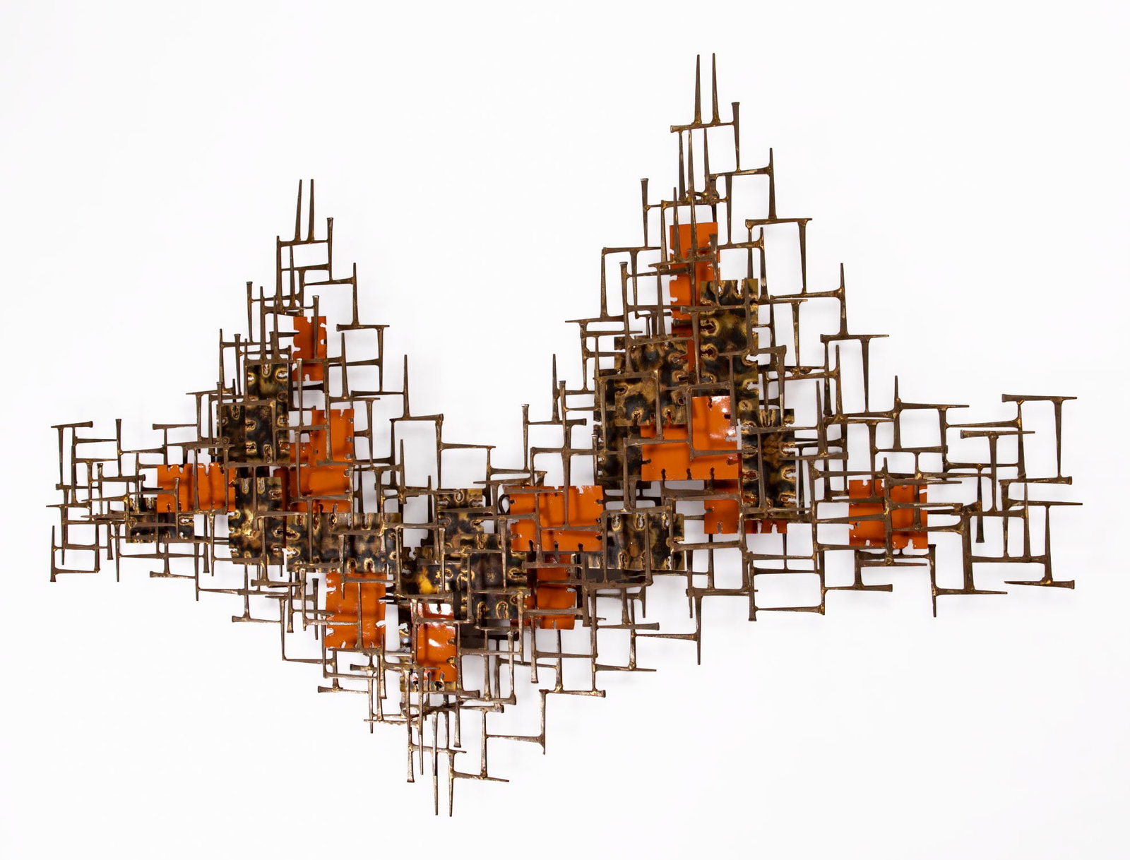 Silas Seandel (b. 1937) American: UNTITLED, welded steel carpenter nails with enameled brass and copper plates wall sculpture, signed on verso, 45 x 72 x 5 ½”, hangs on one hook.