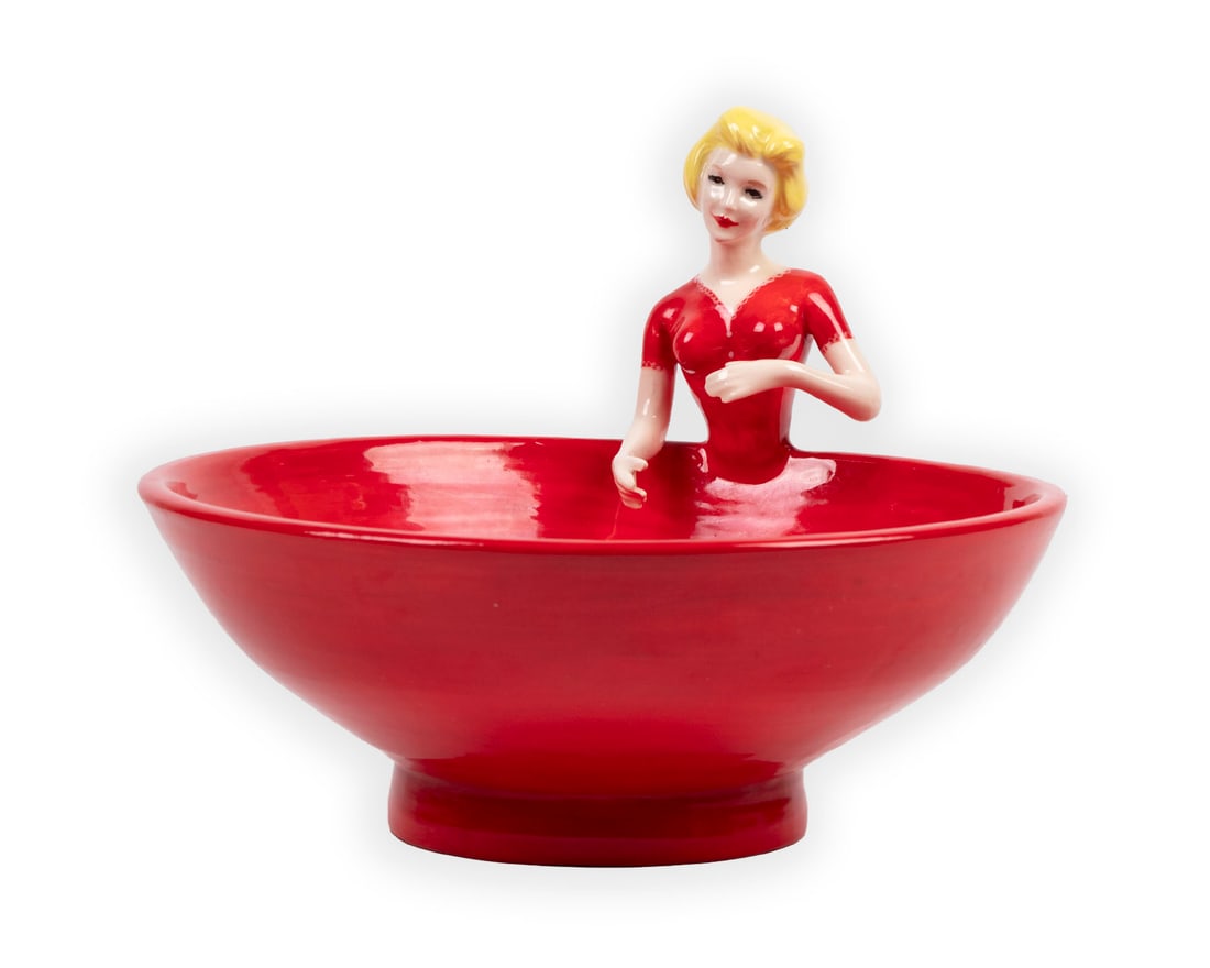 Jennifer Joyce (20th/ 21st Century) California: WOMAN IN RED DRESS, painted and glazed ceramic bowl, signed underneath, 8” tall, 10 ½” diameter. From the collection of David Limburger and Sheila Silber.