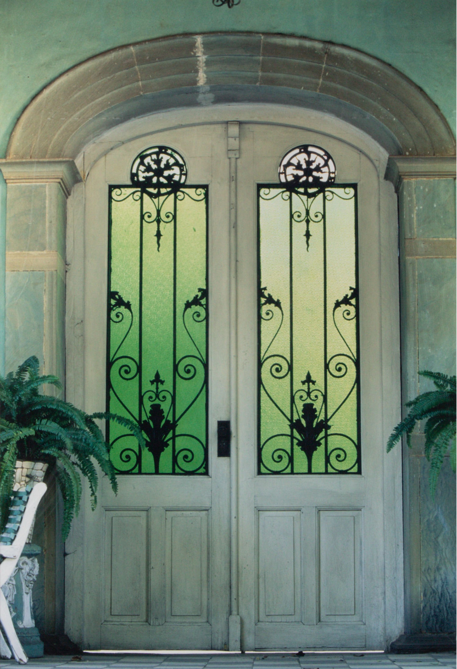 Gary Geiger (20th /21st Century) California: DOORS WITH GREEN GLASS 1994, color photograph, signed and dated in pencil on mat, sight 29 ¼ x 19 ¾”, frame 41 ¼ x 31 ½” with plexiglass (scratched).