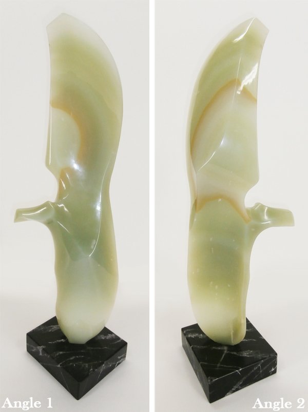 Leonardo Nierman (b. 1932) Mexican: UNTITLED, carved onyx sculpture, signed, 31 ¾” tall, inset into 2 ½” tall marble base, a small rough indentation lower backside, otherwise in good condition.