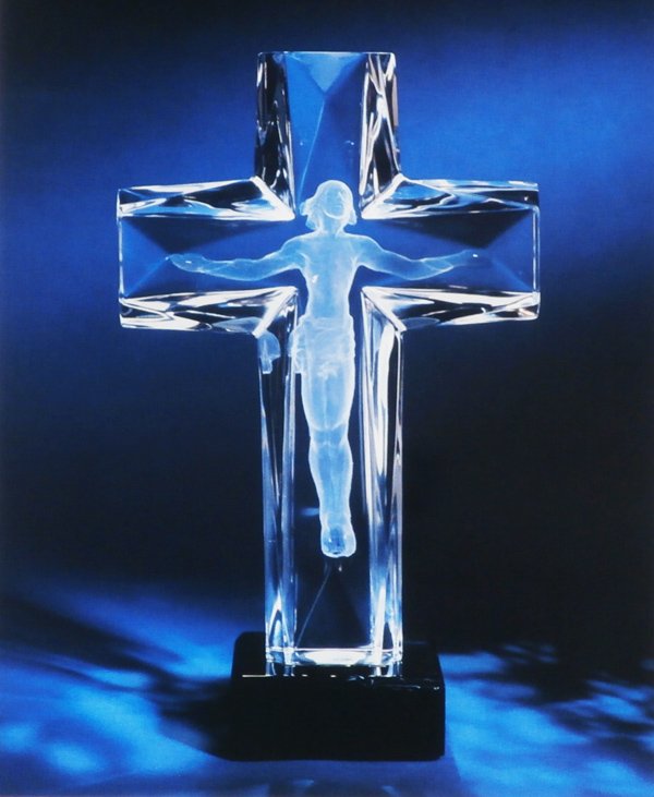 Frederick Hart (1943-1999) American: CROSS OF THE MILLENNIUM, 1995, clear acrylic resin sculpture, second state, from the numbered edition 15,000, signed, 11 ½” tall, with illuminating stand, comes with certificate and original brochu