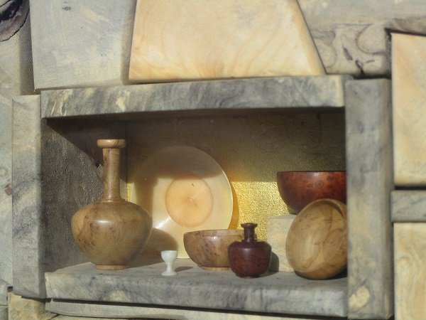 Stephen Paulsen (b. 1947) American: STORAGE CHAMBER, 1985, cut, carved and turned wood, signed and dated lower right, 9 x 11 x 3”, with artist’s box frame, with glass, in good studio condition. Provenance: Del Mano Gallery.