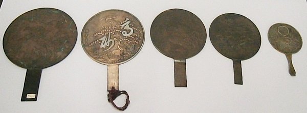 Bronze Mirrors (five): Five metal mirrors from 13 ½” to 8 ¾” long, four with crane and tree design, smallest with bird and flower design, larger four probably Edo period, smaller fifth one probably more modern and may