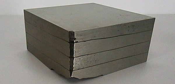 Seiji Kunishima (b. 1937) Japanese: UNTITLED, 1979, four layers white bronze sculpture with stone inside, signed dated and stamped #158 underneath, 3 ½ x 7 ½ x 7 ½”, some minor scuffs and scratches, otherwise in good studio conditi