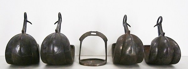 Samurai Abumi (two): Two pairs of 16th century metal stirrups (Abumi) with remnants of silver color floral design and a metal mounting step with engraved gold silver and copper colors, in apparently generally good used an