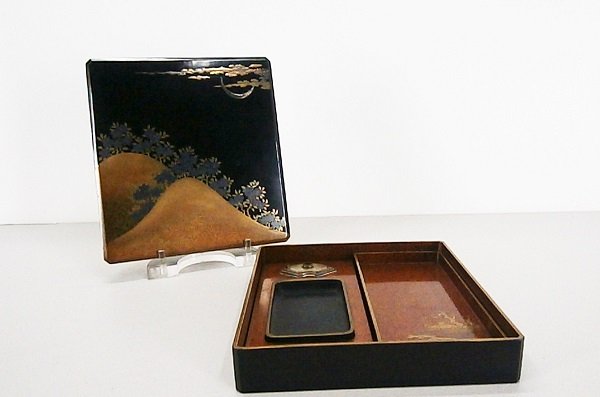 Writer’s Tebako: Takamaki-e over black lacquer with takamaki-e over nashiji interior, most likely Edo period, with ink stone and well in tray, 9 x 8 ¼ x 1 ¾”, a few dimples on lid, otherwise in apparently good age