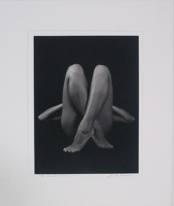 Scott Hanson (20th/ 21st Century) American: NAKITA CROSSED LEGS, 1988, gelatin silver print, signed lower right, titled and inscribed Dec. 1998 and Holiday Edition #46 on back of sealed mat, image 15 ¾ x 12”, full margins, a few surface shin